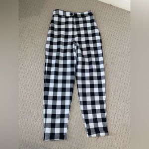 Worn once. Nasty gal work pant. Checkered pattern. In new condition. Size 2.